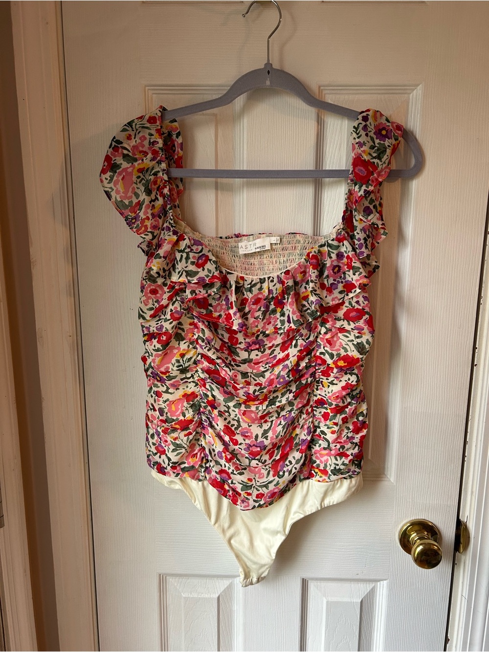 Astr Floral Ruffle Ivory Bodysuit with Pink and Red Blooms